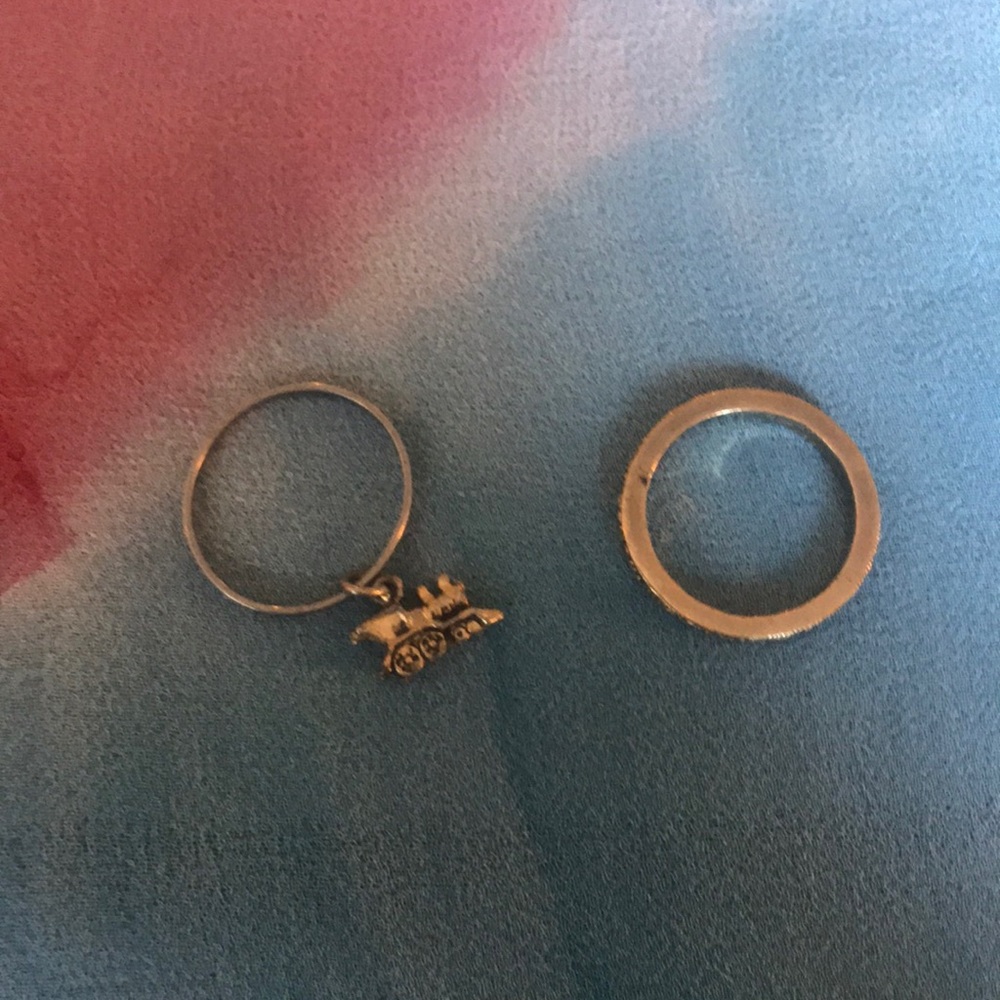 Two thin gold rings train trinket
